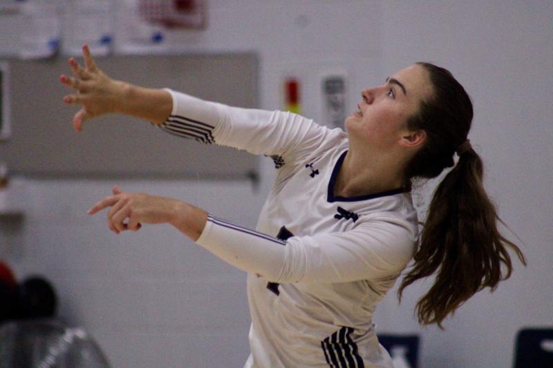 Sussex Academy junior Savannah Montgomery usually digs out serves, but she is the one serving in this shot.