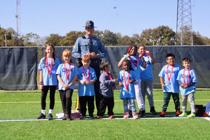As the tournament concluded, Delaware State Police troopers made their rounds to award the winners with first-, second- and third-place medals.