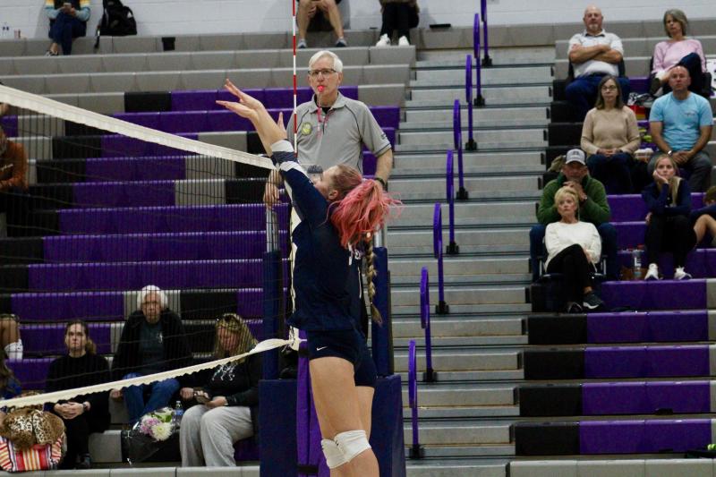 Carmen Merrick, the Seahawks' all-time leader in blocks, teams up with fellow senior Grace Fiorilla for a block.