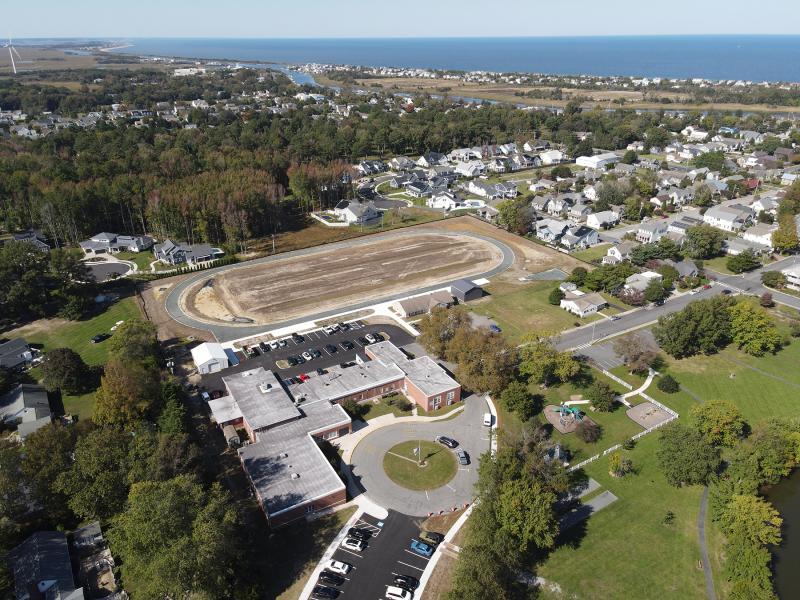 The campus stretches all the way to the Fred D. Thomas Building on DuPont Avenue, where a new cinder track, shot put pit and football field are taking shape. NICK ROTH PHOTO