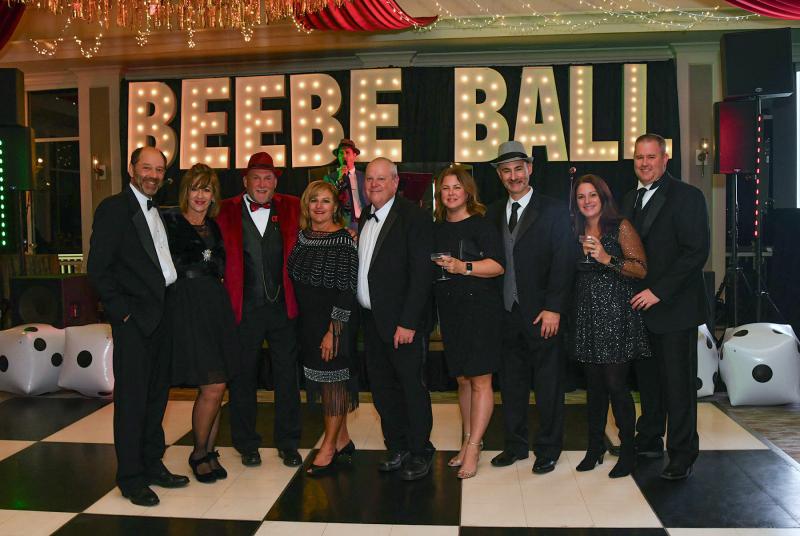 The Whiting-Turner group guests are (l-r) Chris Mitchell and Amy Mitchell, Jim and Debbie Martini, Scott Saxman, Jen and Josh Fanelli, and Jen and Josh George.