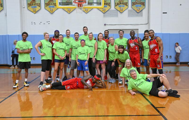 Cape Crusaders team members are (l-r) Tysean Hazzard, Kelly Hines, Sheri Klemkowski, Eric Croce, Rob Scisco, Stacy Koch-Jester, Brian Gadzinksi, Jennifer Hochrein, Heather Flood, Meghan Catts, Jaime Pereda, Beth Thomas, Trevor Reed, coach Lisa Grossman and Walter Hetfield. Wizards players are (l-r) Loonatik, Space Jam, Mr. Bounce, Broadway and Livewire.