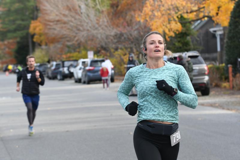 Brittany Croll briskly crosses the line in 23:08.