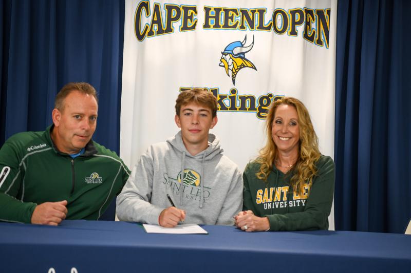 Michael Guenther will attend St. Leo to play lacrosse. Shown are (l-r) Michael Scott Guenther, Michael William Guenther and Kelly Guenther.