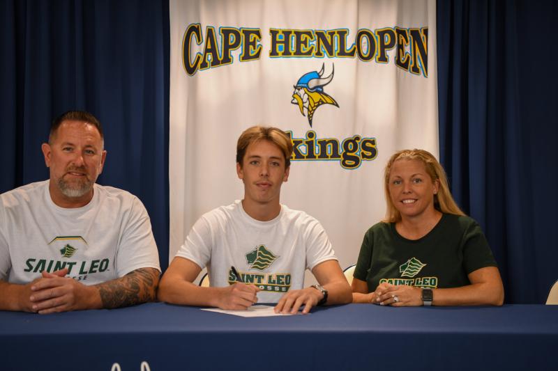 Anderson Smith will attend St. Leo to play lacrosse. Shown are (l-r)
Larry Smith, Anderson Smith and Michele Smith.