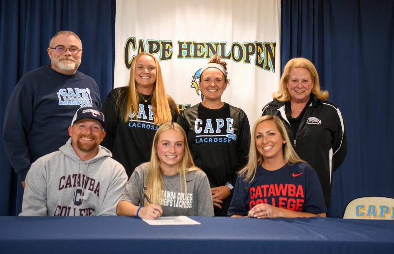 Hannah Abel will attend Catawba College to play lacrosse. Shown in back are (l-r) Bruce Leibu, Lindsey Underwood, Leigh Rupar and Lyn Shoop. In front are Leland, Hannah and Rhianna Abel.