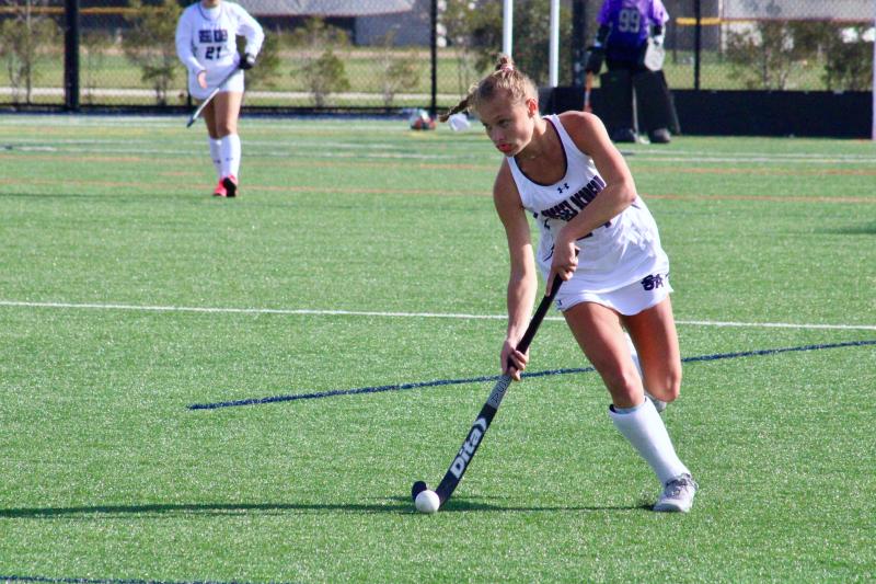 Sussex Academy freshman midfielder Meredith Schiff charges upfield. Her relentless effort was accompanied by a few laughs in the game.