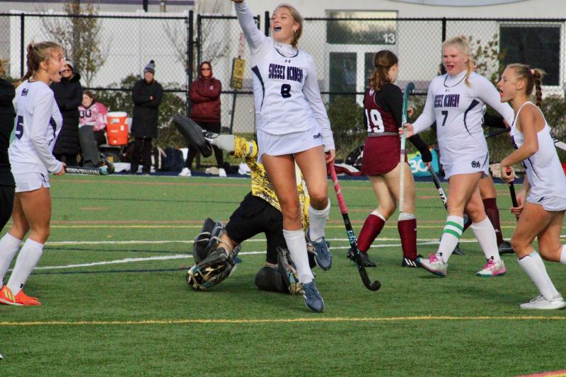 Sussex Academy sophomore Ryan Lowe opens up the scoring with a hop, skip and goal. Shown are (l-r) Emma Campbell, Lowe, Callie Short and Meredith Schiff.