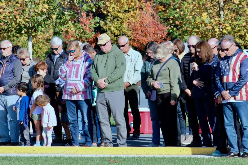 More than 100 people attended the special ceremony. A wide range of ages takes a moment of silence to remember the sacrifices made by veterans.