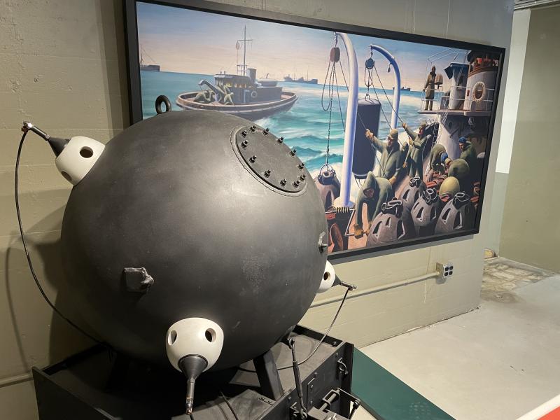 The Fort Miles mines were connected to a central command center. A passing ship would trigger a signal to Mine Command personnel.