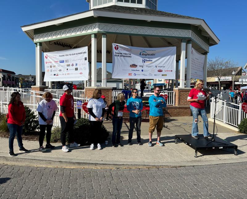 Shabool Henry, executive director of the American Heart Association of Delaware, left, joins members of the Heart Walk leadership team. Shown are (l-r) Henry; Jeanne Ruff, TidalHealth; Tom Trobiano, Beebe Healthcare; Lisa Tighe, Fulton Bank; Sheila Cisco, County Bank; Dr. Robert Scaffidi, Bayhealth; Ben Collins, Bayhealth; and Cathy Bassett, Heart Walk chair and director of communications at Mountaire Farms.