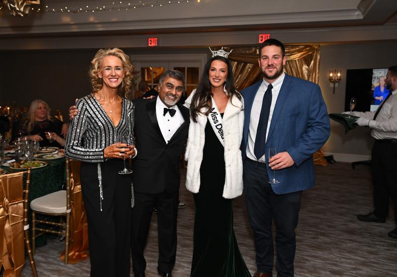 Posing for a picture are (l-r) Harry K Foundation Vice President Tarrie Miller, Harry Keswani, Miss Delaware 2023 Emily Beale and her fiancé Ches Townsend.