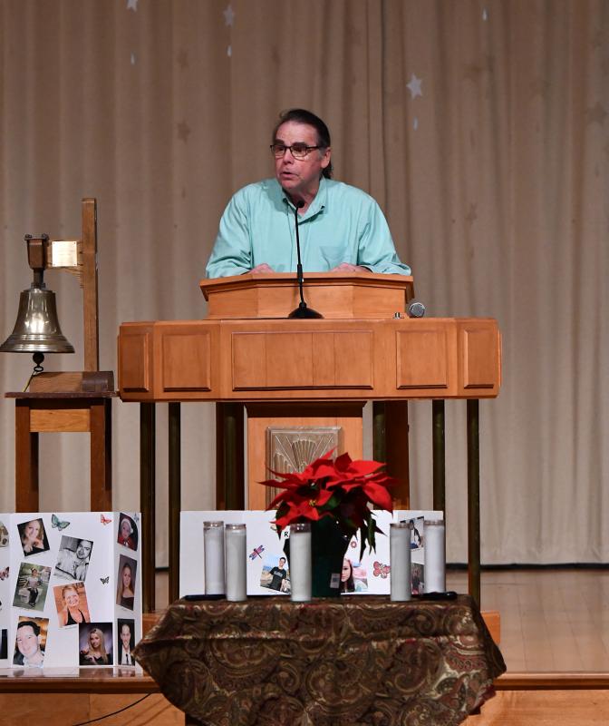 Bill Hicks welcomes attendees to the 27th annual Worldwide Candle Lighting Ceremony to honor children who have died.