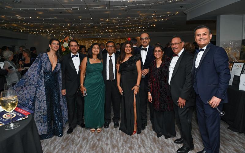 Posing for a cocktail hour picture are (l-r) Helen Damouni, Joydeep Haldar, Vibha Sanwal, Punkaj Sanwal, Manu Sehgal, Shalini Sehgal, Ranna Goyal, Mahek Goyal and Fadi Damouni.
