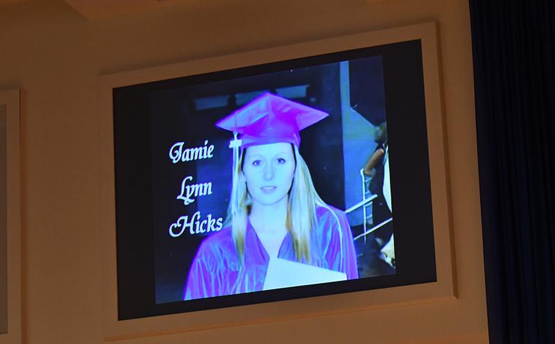 A photo of Bill and Jill Hicks’ daughter, Jamie Lynn, lights up the screen above the alter at Epworth.