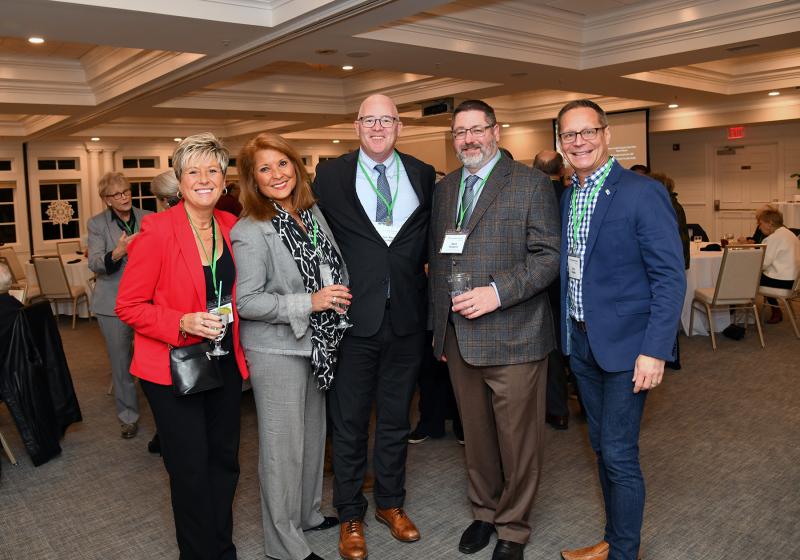 Enjoying the cocktail hour are (l-r) Joann Glussich; Suzanne Krupa; Sen. Russ Huxtable, D-Lewes; Mark Purpura; and Chris Beagle.
