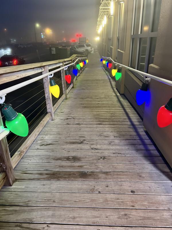 Giant brightly colored bulbs lead the way to the annual tree lighting ceremony at The Lighthouse in Dewey Beach.