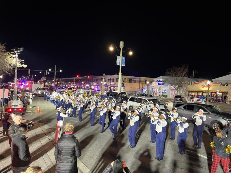 The Cape Henlopen High School marching band performs in the front of the Rehoboth Beach fire station.