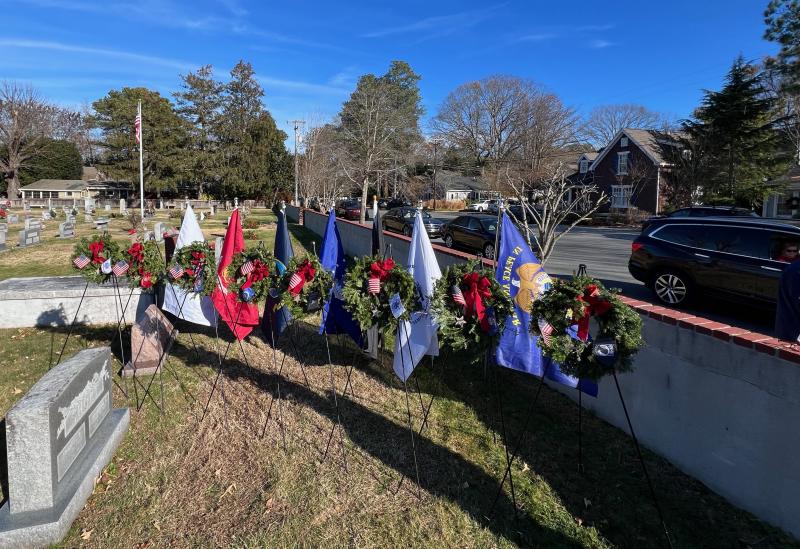 Service wreaths representing all branches of the armed forces and POW/MIAs.