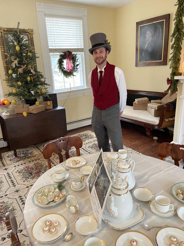 Ryan Schwartz, society director of interpretation, gives tours of the Burton-Ingram House parlor decorated for the holidays. The parlor and dining room will undergo a major project in 2024 as the society has plans to turn the rooms from their present 1830-1850 time period to the 1780s time period, which are the years the house was built.