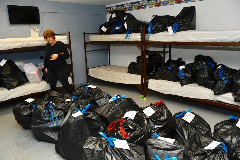 Volunteers sorted and packed nearly 1,000 bags like these for parents and organizations who registered during this season’s campaign.