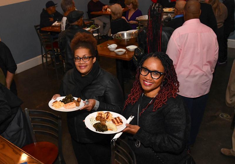 Carlin Miller, left, and Emily Everhart just filled their plate at the buffet.