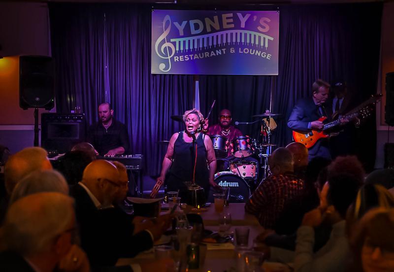 Mary “Snow” Brown sings with the popular band Comfort Zone.