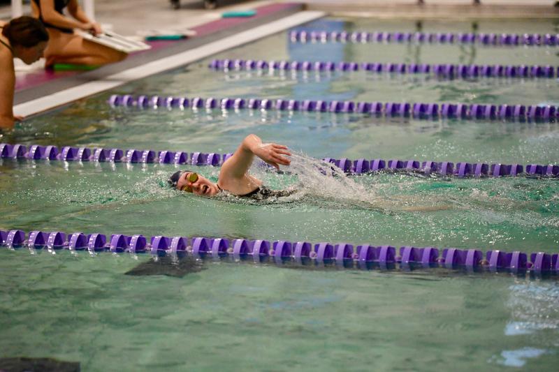 Sussex Academy eighth-grader Gretchen Maughan takes one last stroke before her turnaround during her winning 5:49.54 in the 500 freestyle.