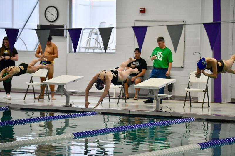 Sussex Academy senior Gracie Maughan dives in to win the 100 butterfly during a tri-meet against Caesar Rodney and Indian River Jan. 23. Both teams swept their Henlopen Conference opponents.
