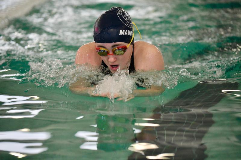 Sussex Academy eighth-grader Gretchen Maughan swims the breaststroke on the way to her 2:23.58 victory in the 200 individual medley.