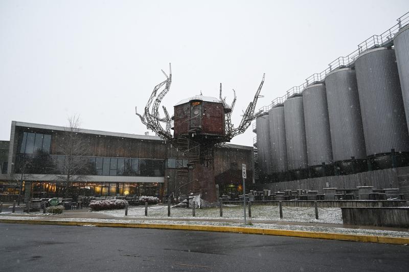 Snow falls on Dogfish Head brewery in Milton. NICK ROTH PHOTO