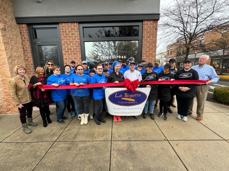 La Baguette French bakery cuts ribbon in Villages of Five Points
