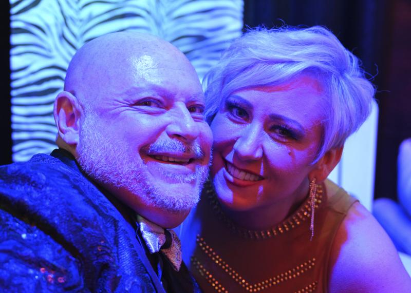 Manny Mann, aka Manny Panebianco, the emcee for the evening, is all smiles with Ann Marie Truszcienski.