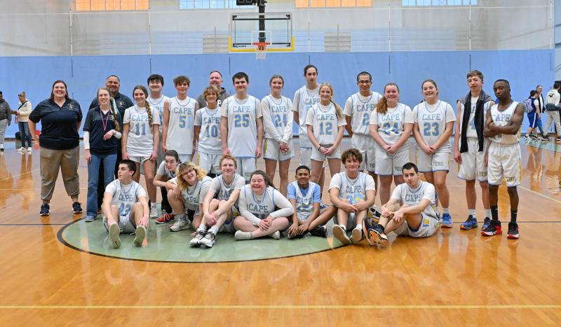 The Cape unified basketball team is a close-knit, compassionate group of players and coaches. Shown in back are (l-r) coach Katie Collick, coach Elle Nauman, coach JD Maull, Brynne Fox, Jerome Kochinsky, Aiden Wells, Cooper Forcucci, coach Tom MacLeish, Randolph Adams, Grace Wiggins, Ruben Valdes-Alvarez, Addy Basile, Alejandro Alvarez-Roman, Alivia Heers, Lina Frederick, Connor Pencek and Noah Ryan. In front are (l-r) Isaiah Magathan, Peyton Lamson-Reich, Charlotte Maxwell, Bennett Steinmann, Sara Davis, Zane Richardson, Jack Huss and Vlad Ticalaand. DAN COOK PHOTOS