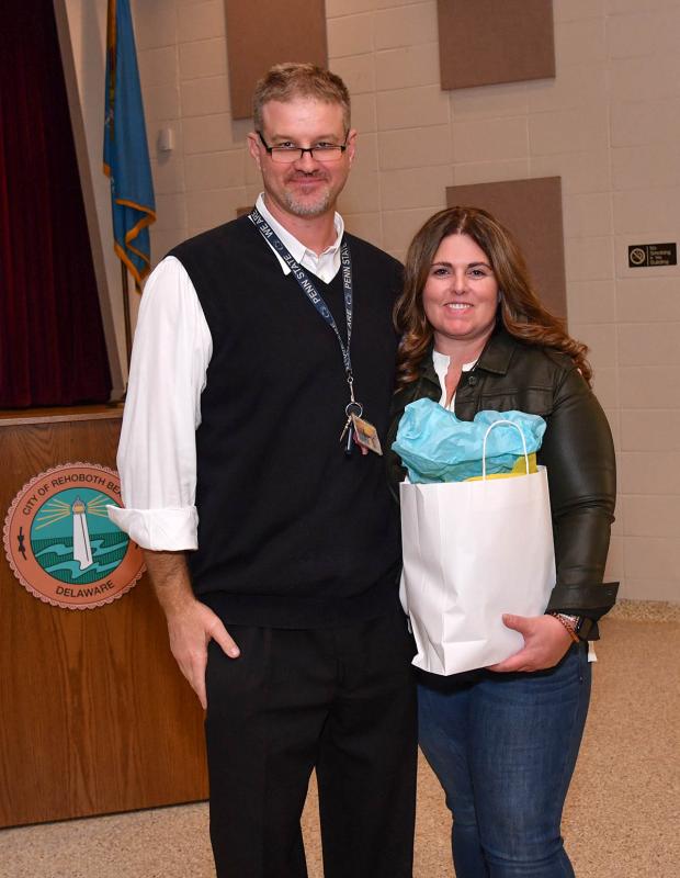 Cape head coach Mike Frederick thanks boosters Vice President Joy Bitter for the work she has given the team.