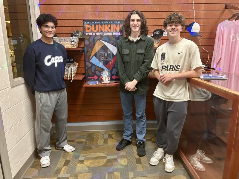 Cape High DECA officers (l-r) Krish Prattipati, Andrew Racz and Jack Flynn have helped organize and promote a game show-style fundraiser to offset costs to attend the international competition. ELLEN DRISCOLL PHOTO
