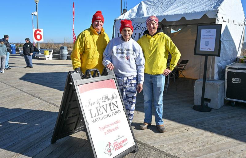 Irv and Phyllis Levin, whose son is a Special Olympics Delaware athlete, matches the donation of anyone during the plunge. Shown are (l-r) Special Olympics Delaware’s Director of Media Relations Jon Buzby, Irv Levin and Special Olympics Delaware President David Halley.