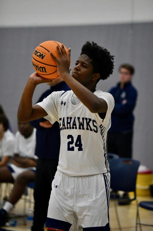 Seahawks freshman Sebastien Paul gets a rare clean look he takes advantage of. Paul is usually drawing contact.