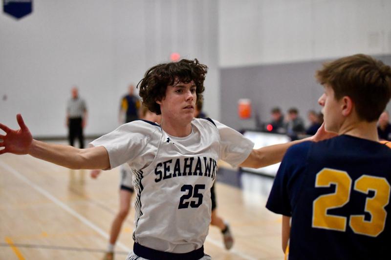 A key to the victory was the relentless press led by the baseline defense of sophomore Nate Elliott.