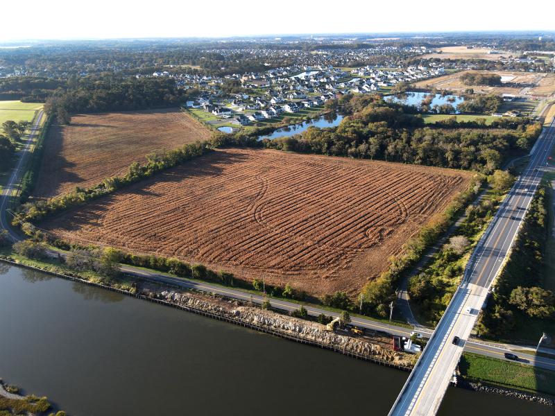 The parcel where Henlopen Bluff would be built is located along Gills Neck Road. Lewes Mayor and City Council remanded 25 conditions back to the planning commission at its Feb. 12 meeting. They added recommendations for a crosswalk on Gills Neck Road and sidewalk connectivity to downtown. NICK ROTH PHOTO