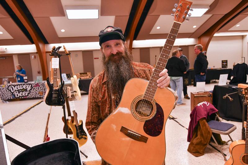 John Callahan shows his Zager Ez-Play made and played by a Denny Zager of the group Zager & Evans, which played “In the Year 2525.”