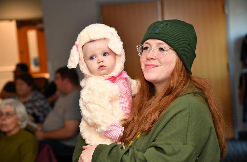 Enjoying the event are Chanale Vogel, co-director of Chabad of Southern Delaware, and baby Zeesa Vogel.