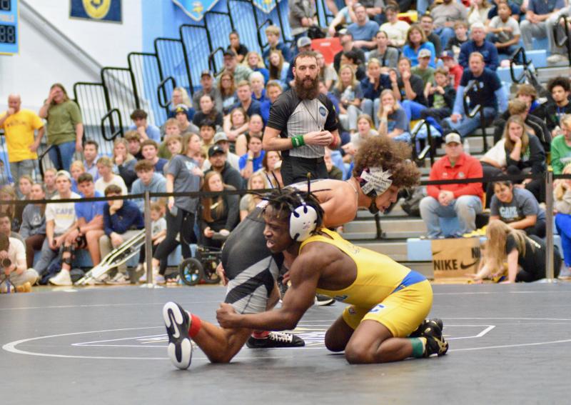 Sussex Central junior Malachi Stratton clinched his third straight wrestling state championship after defeating Sussex Tech’s Anthony Andrews in the 120-pound match.