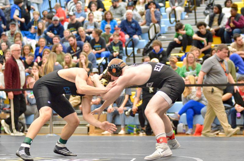 Cape sophomore Nick Walker locks up with Sussex Tech’s Dustin Elliott in the all-Henlopen 144-pound final.