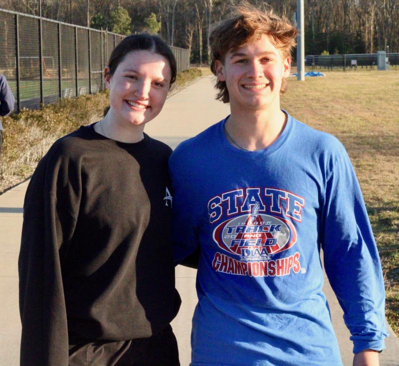 Seniors Lily Bowe, left, and Justin Friscia were part of cross country teams that finished first and third, respectively, in the Henlopen Conference this past fall. They hope to carry that momentum into spring.