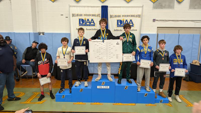 Winners, like Cape freshman Austin Guerrieri, get the brackets and the top spot on the podium. Shown are (l-r) Dominic Spennato, Mason Catania, Cole Perrin, Guerrieri, Clif Bakhsh, Ben Donato, Michael Pierson and Austen Decker.