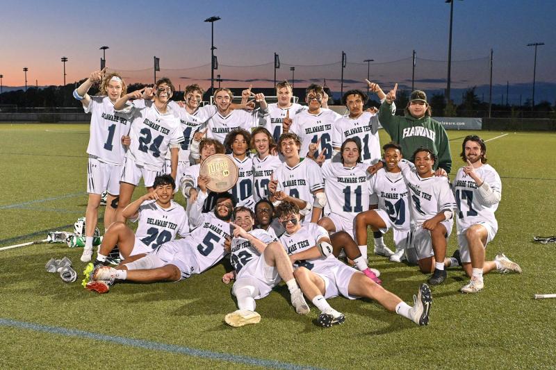 The Del Tech squad celebrates the Region 19 Championship. Shown in back are (l-r) Chris Allen, Sam Karnoff, Brady Nicol, Luke Broomell, Paul Urbaniak, Ethan Parker, Brian Johnson and Trey Wilson. In middle are Maxwell Grey, Darius Hunt, Mathew Tully, Cameron Hellens, Shane Sylvester, Kendric Jones and Tyree Heath. In front are Abdiel Soto, Malaki Balentine, Christopher Phillips, Xavier Dunaway and Dominic Hippler.