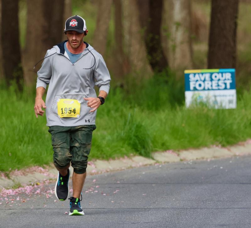 Joseph Goulet of Marydel runs the inbound leg past the 29-acre preserve on Fourth Street. Goulet was first in the male 30-39 division.