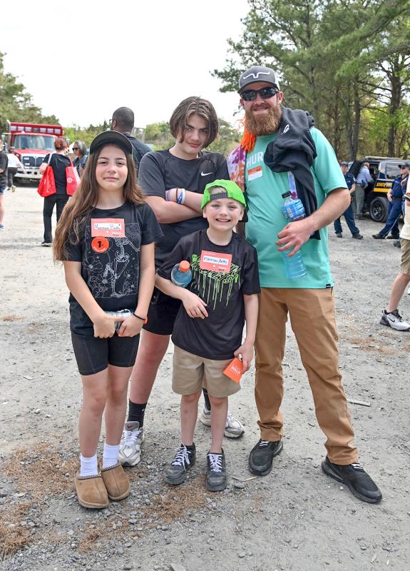 Walking to honor their mom mom Betty are Corina Trigger, 11; Cameron Dyson, 13; Carter Burnett, 8; and Kyle Wheatley.