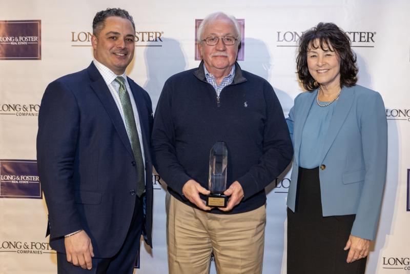 Long & Foster Rehoboth Beach realtor Bill Cullin has been recognized as the company’s Overall Top Agent in Delaware for the fourth consecutive year. Pictured during the award ceremony in February are (l-r) Ralph DiGuiseppe III, senior vice president, regional manager, Pennsylvania, New Jersey, Delaware & LF Vacation Rentals; Cullin; and Jackie Thiel, president, general brokerage, Long & Foster Real Estate. SUBMITTED PHOTO